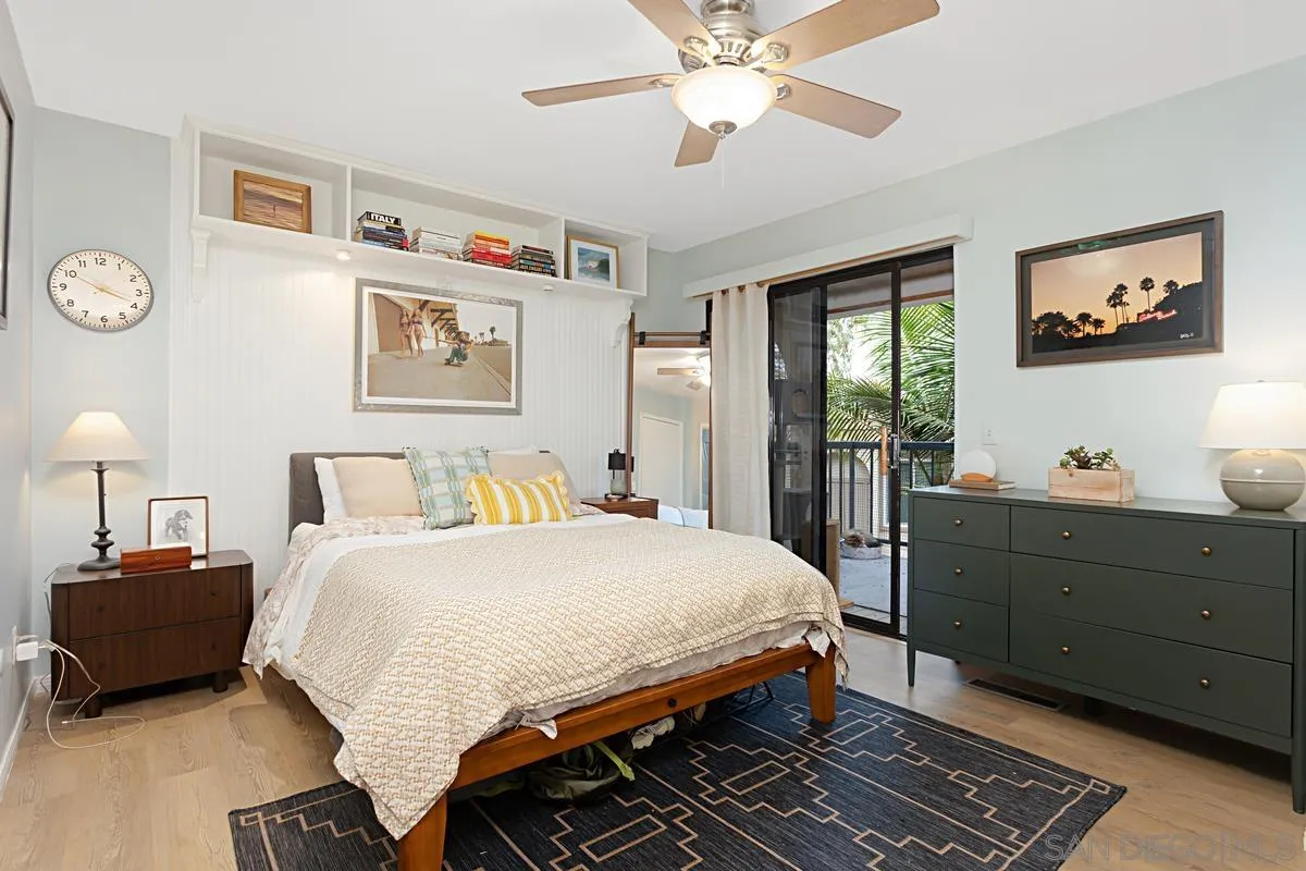 2383 Altisma Way, Unit B Carlsbad, CA 92009 - Photo 16 of 38 a bedroom with a bed and a dresser
