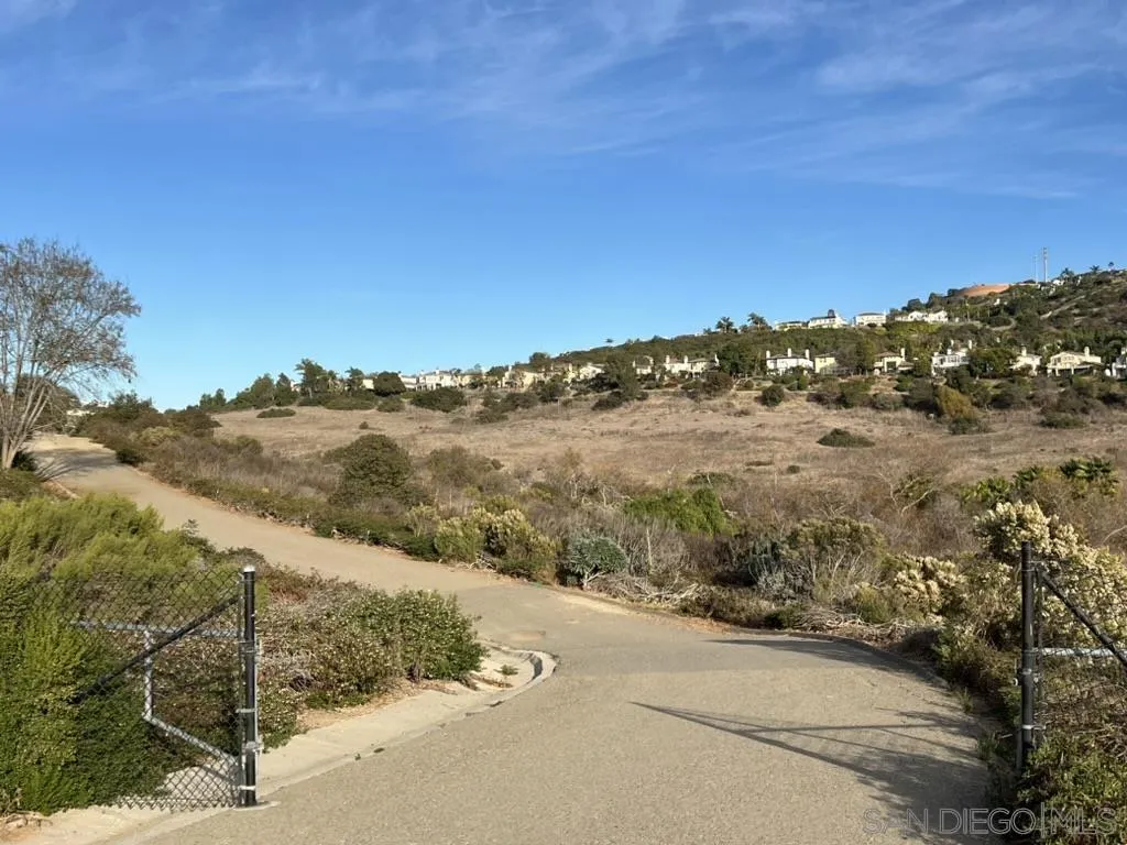 2383 Altisma Way, Unit B Carlsbad, CA 92009 - Photo 30 of 38 a view of a road with an ocean view