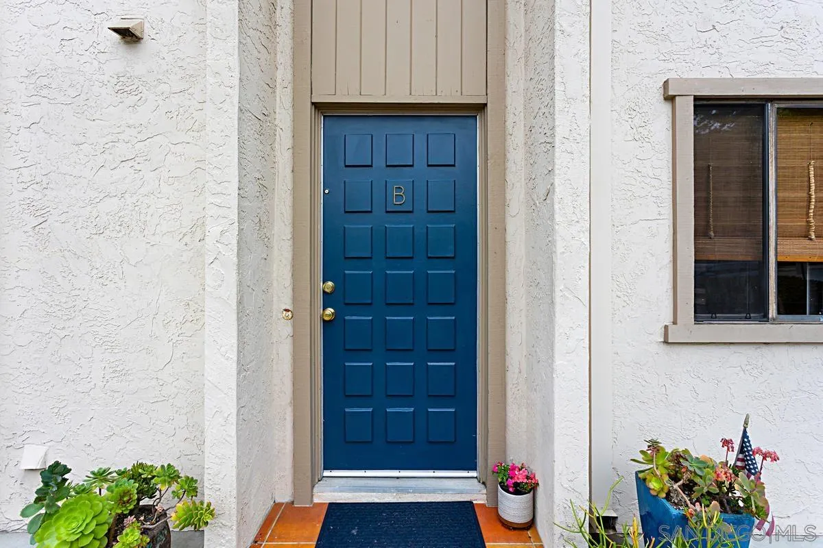 2383 Altisma Way, Unit B Carlsbad, CA 92009 - Photo 3 of 38 a view of front door of house