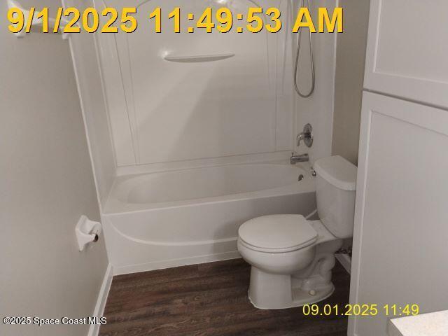 575 Dryden Circle Cocoa, FL 32926 - Photo 17 of 22 a bathroom with a toilet and a shower