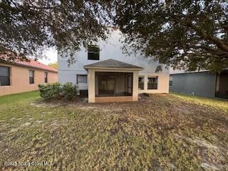 575 Dryden Circle Cocoa, FL 32926 - Photo 19 of 22 a front view of a house with garden
