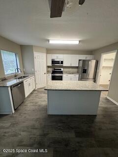 575 Dryden Circle Cocoa, FL 32926 - Photo 9 of 22 a large kitchen with granite countertop a stove and a sink