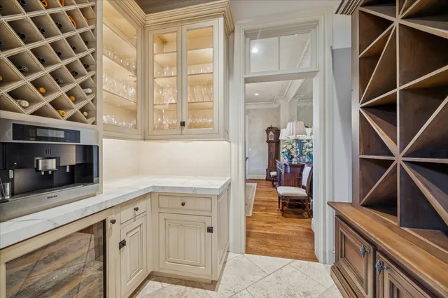 a view of a very nice looking living room with a large window