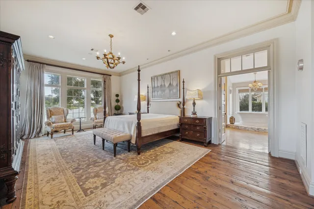 a spacious bathroom with a sink mirror and a bath tub