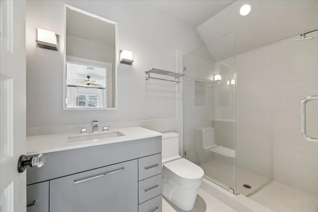 a view of play room with furniture and toys