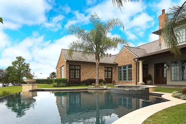 a living room with furniture fireplace and a flat screen tv