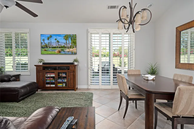a view of a livingroom with furniture and windows