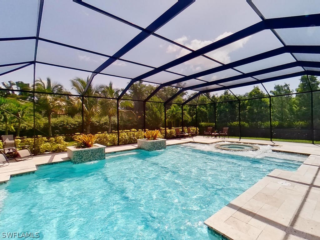 8920 Rails End Court Fort Myers, FL 33919 - Photo 22 of 35 a view of yard with swimming pool