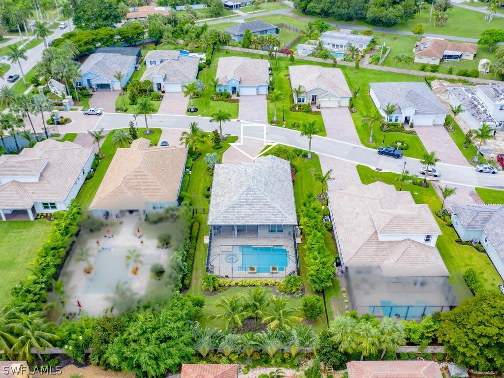 8920 Rails End Court Fort Myers, FL 33919 - Photo 30 of 35 an aerial view of residential houses with outdoor space