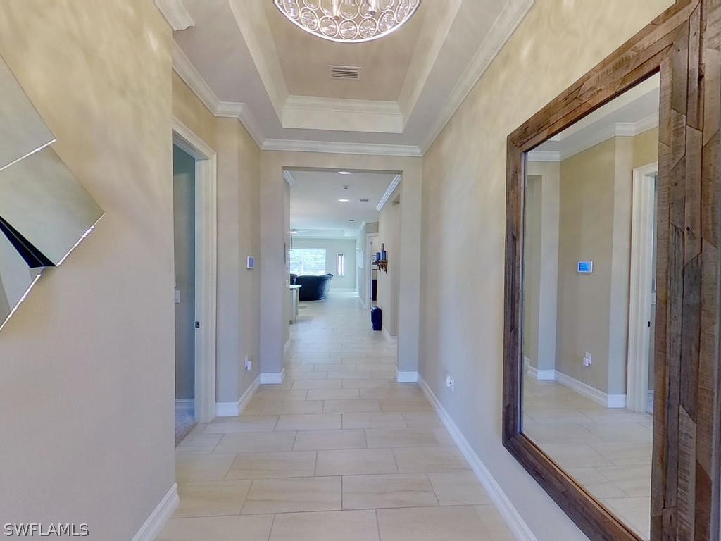 8920 Rails End Court Fort Myers, FL 33919 - Photo 3 of 35 a view of a hallway with a view of a hallway