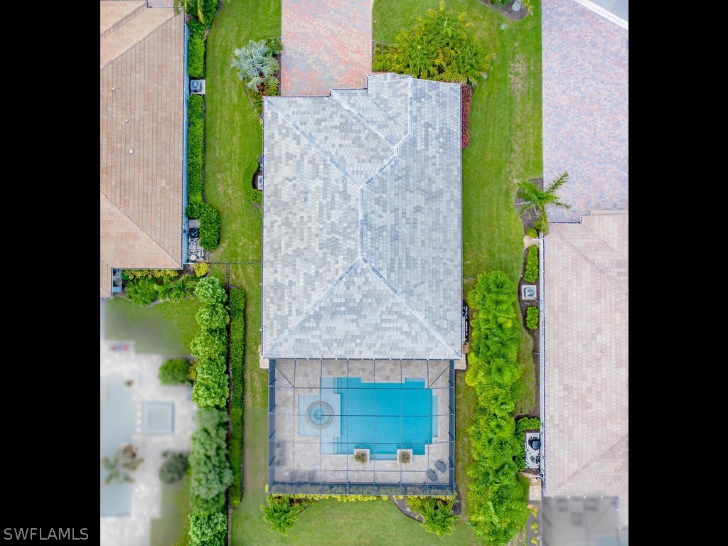 8920 Rails End Court Fort Myers, FL 33919 - Photo 31 of 35 an aerial view of a house with a garden and plants