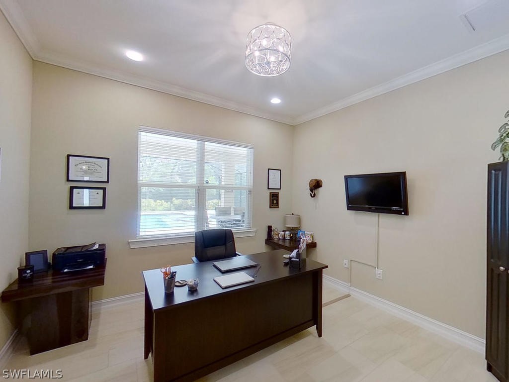 8920 Rails End Court Fort Myers, FL 33919 - Photo 7 of 35 a living room with furniture and a flat screen tv