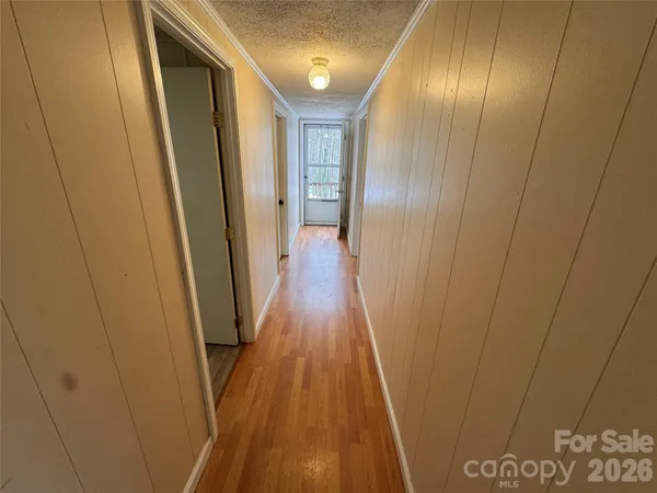 a view of empty room with closet