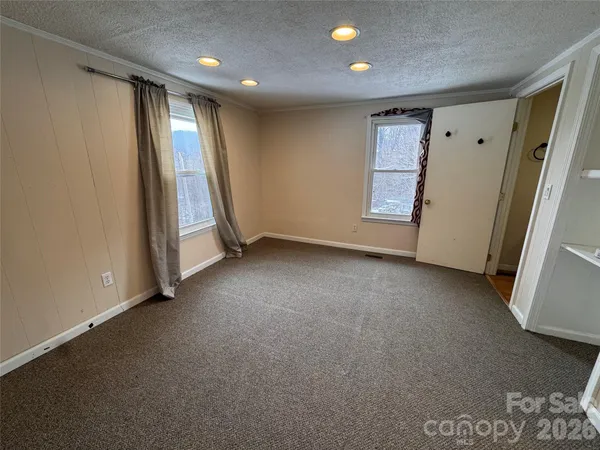 a bathroom with a tub and a shower