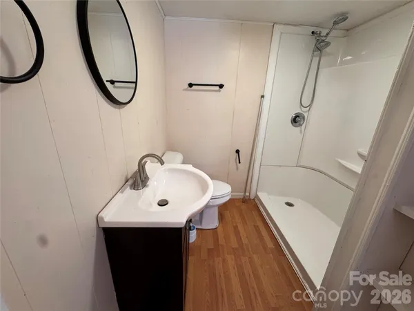 a bathroom with a sink and a white cabinet