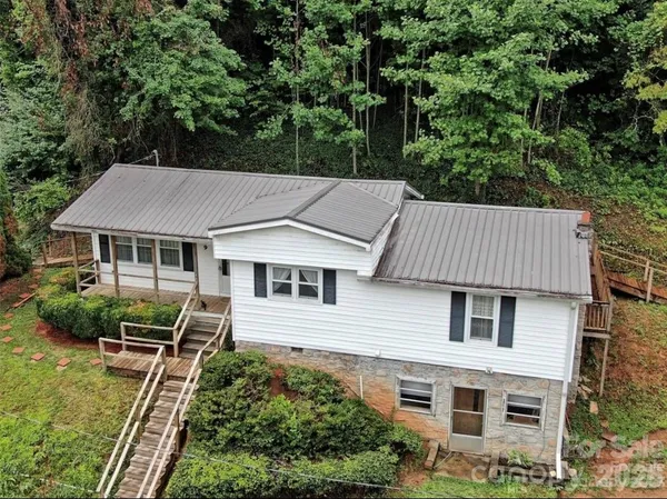 an aerial view of a house yard
