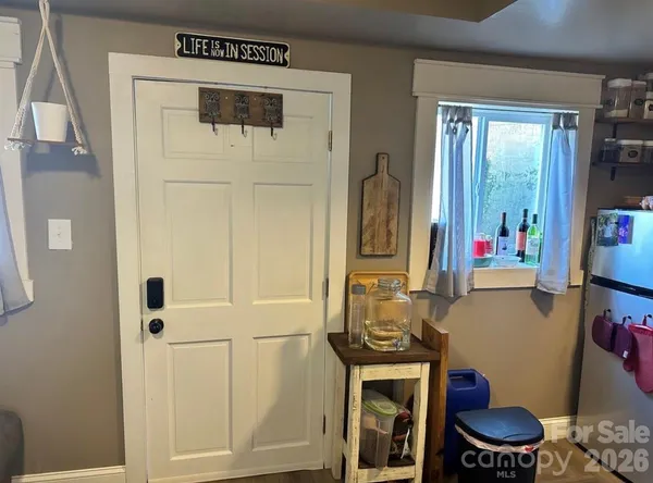 a kitchen with a appliances and cabinets