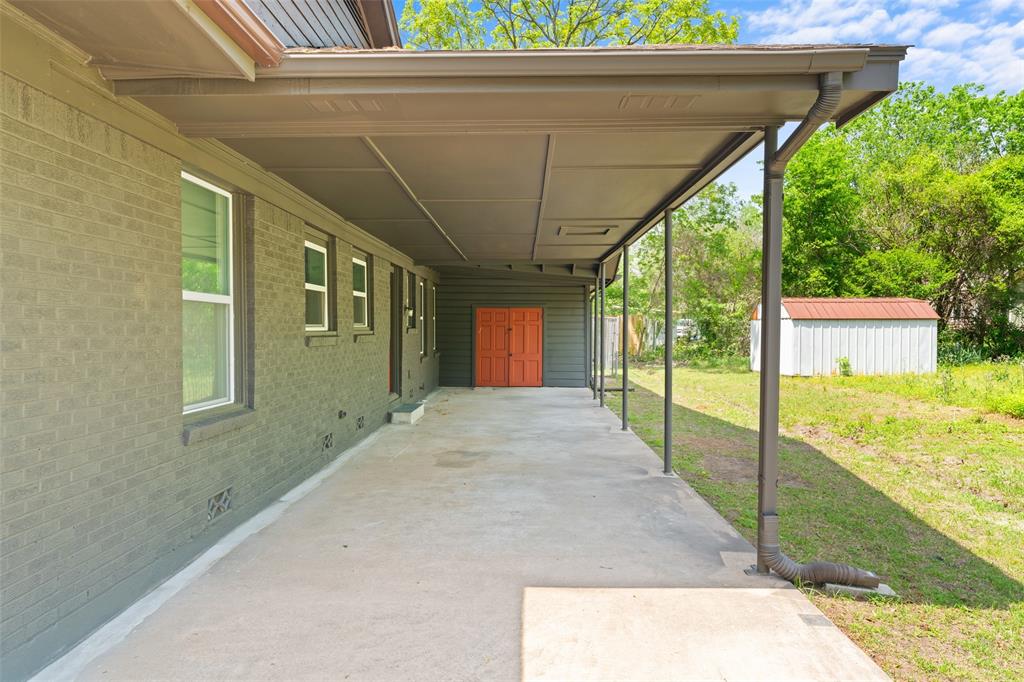 2405 Monroe Street Commerce, TX 75428 - Photo 30 of 31 a view of a porch