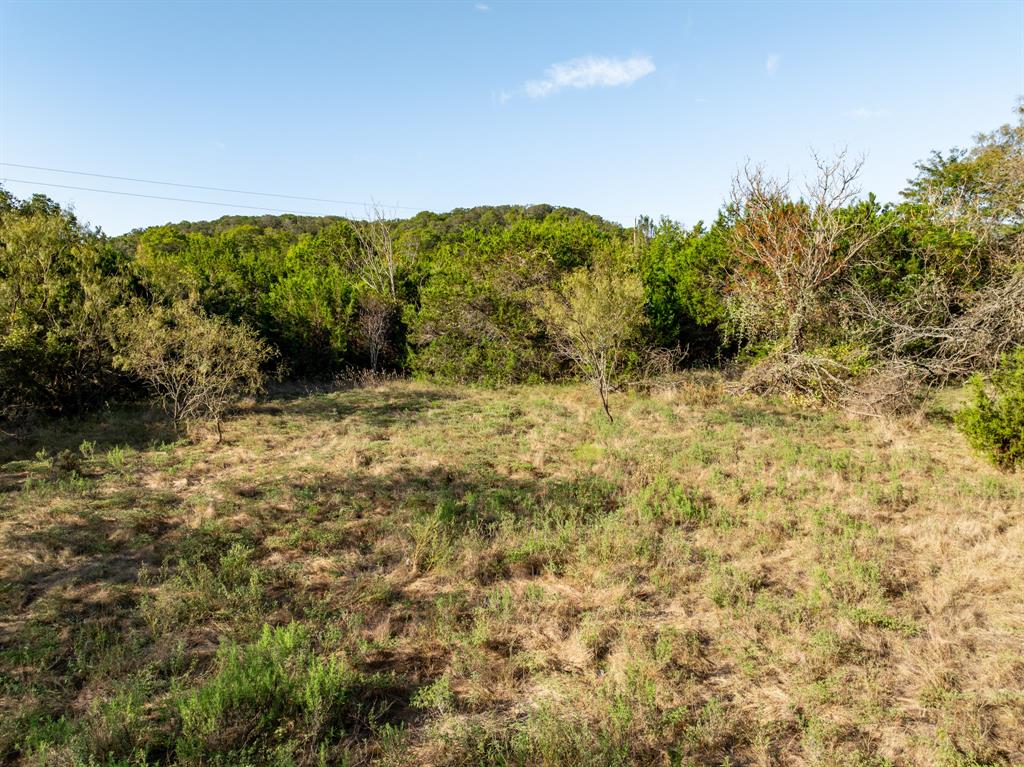 Tbd Tbd Tx-6 Clifton, TX 76634 - Photo 27 of 28 a view of a lake with mountains in the background