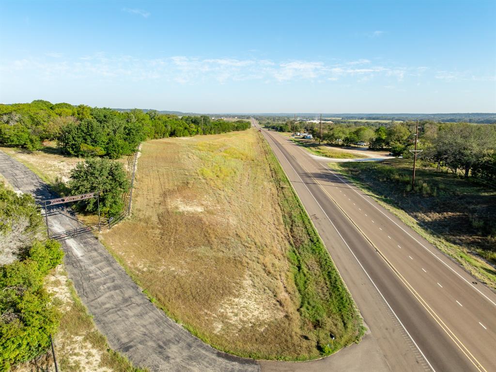Tbd Tbd Tx-6 Clifton, TX 76634 - Photo 8 of 28 a view of a swimming pool with an outdoor seating and a yard
