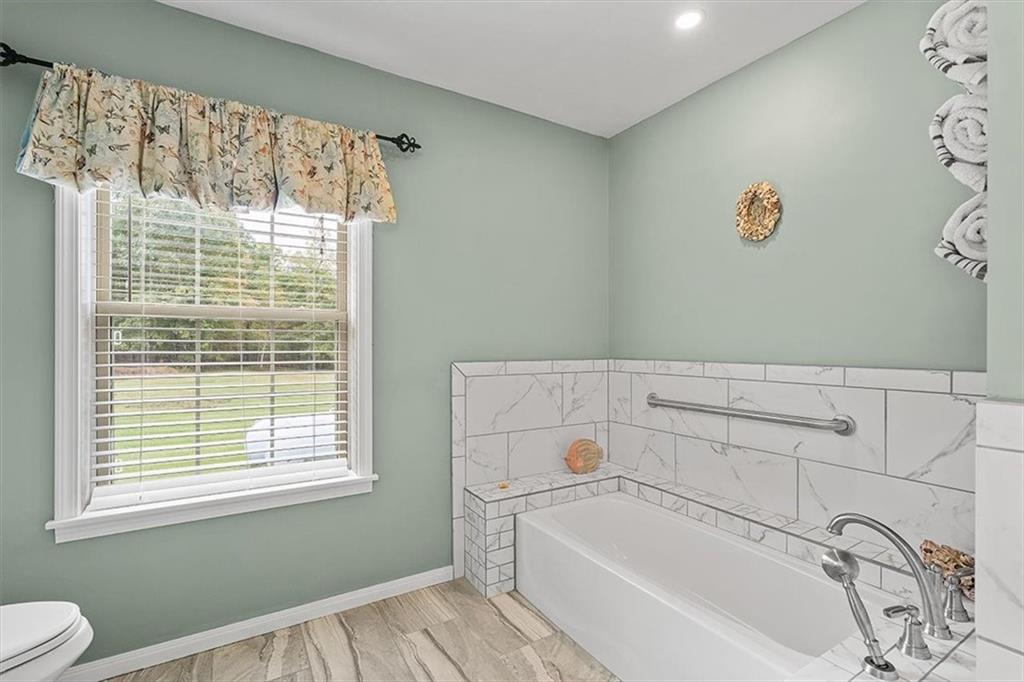 166 Ed Lees Lane Kennerdell, PA 16374 - Photo 12 of 46 Enjoy the tub in the master bathroom for a nice, relaxing soak