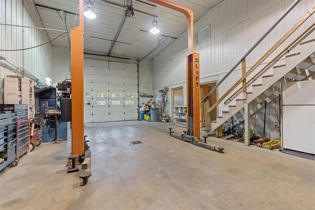 166 Ed Lees Lane Kennerdell, PA 16374 - Photo 26 of 46 Mechanical lift in the "mechanics haven" inside of garage