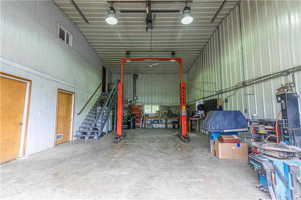 166 Ed Lees Lane Kennerdell, PA 16374 - Photo 27 of 46 2nd view of mechanical lift in the "mechanics haven" inside of garage