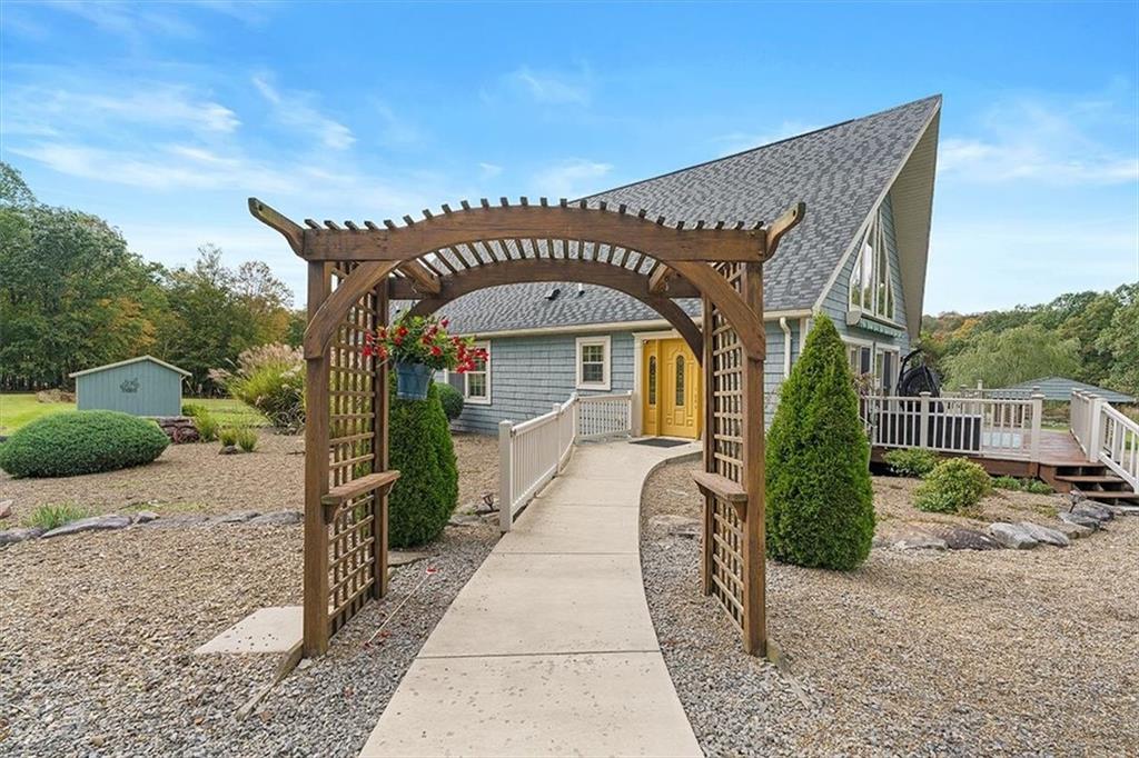 166 Ed Lees Lane Kennerdell, PA 16374 - Photo 38 of 46 Pergola welcomes you into the level-entry home