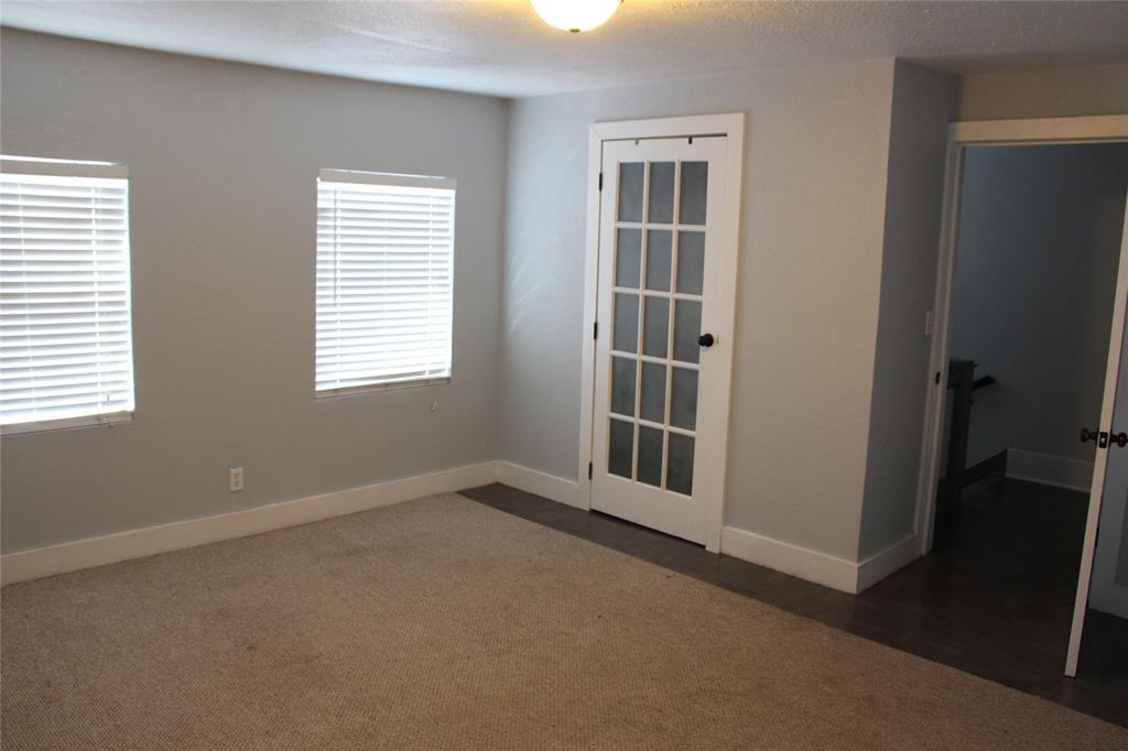 503 West 9th Street Cisco, TX 76437 - Photo 6 of 9 a view of an empty room with a window