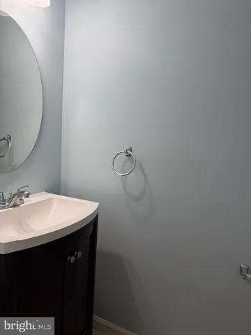 a view of a hallway with windows