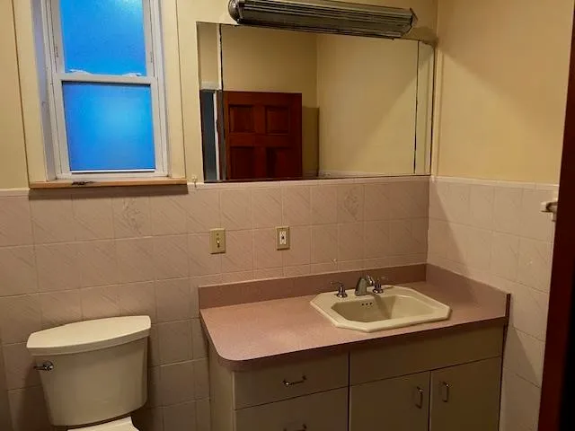 a bathroom with a sink and a toilet
