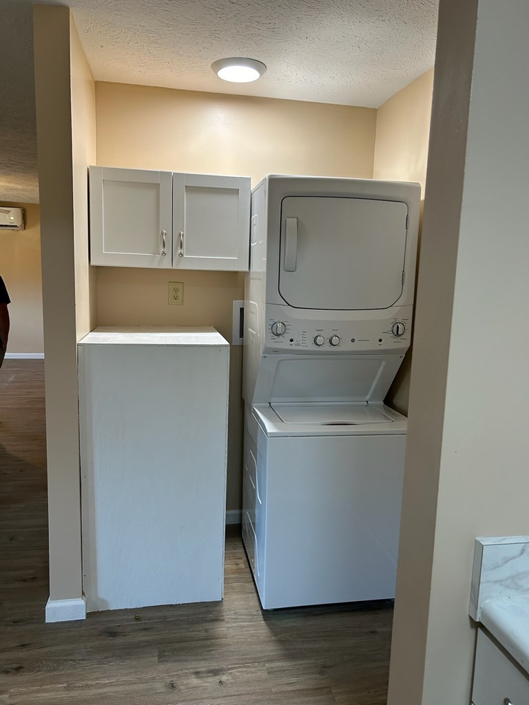 1310 Dr Brooks Road Box Springs, GA 31801 - Photo 3 of 7 a utility room with wooden floor washer and dryer