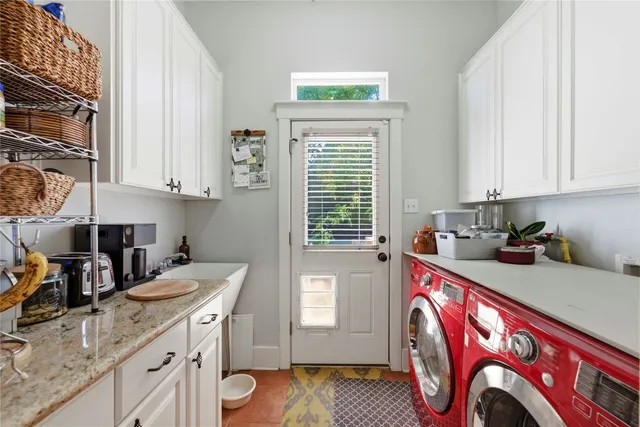 a open kitchen with stainless steel appliances granite countertop a lot of counter space and wooden floor