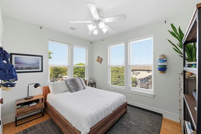 a bathroom with a sink mirror and toilet