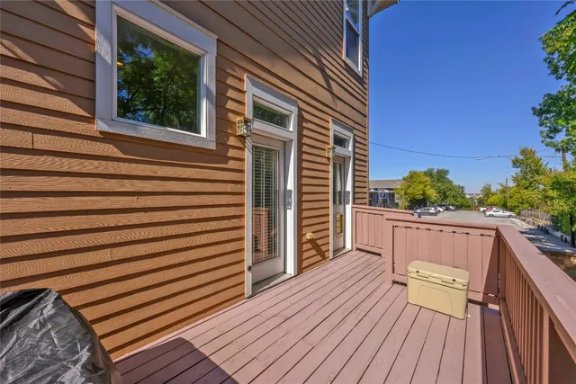 a view of balcony with furniture