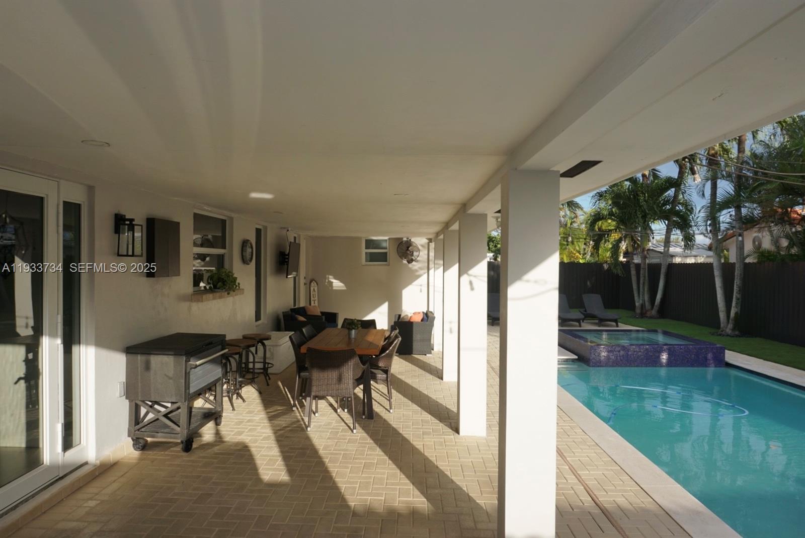 10350 Southwest 16th Street Miami, FL 33165 - Photo 46 of 48 a view of a living room and dining room