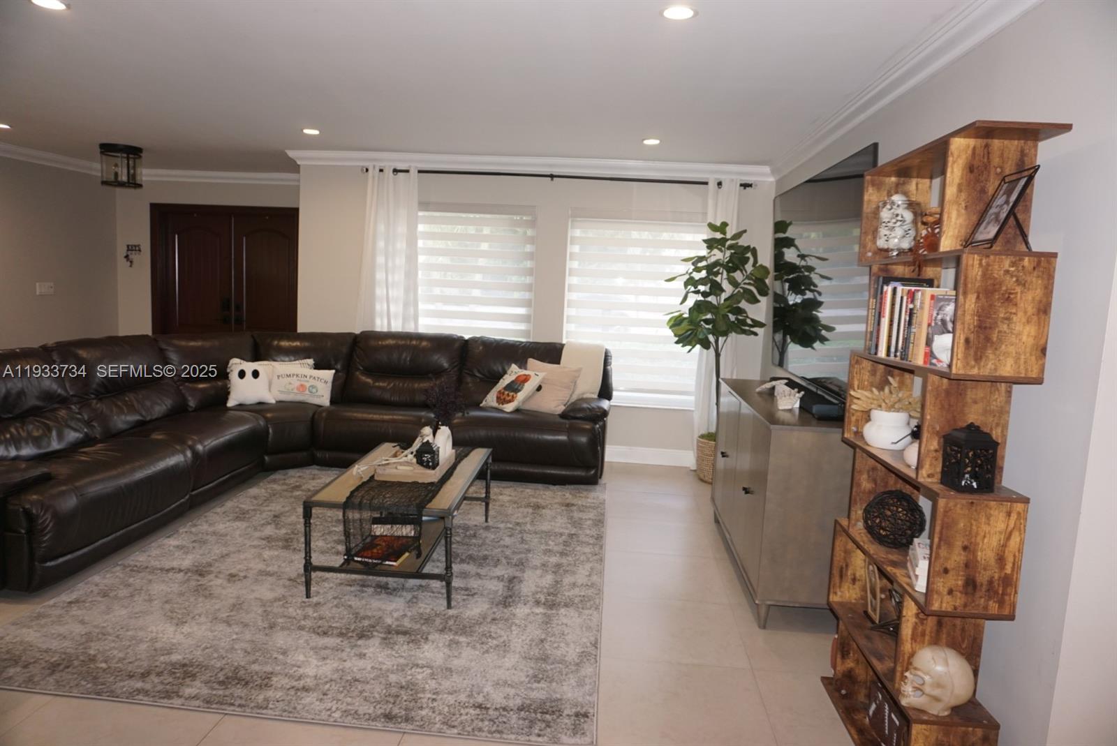 10350 Southwest 16th Street Miami, FL 33165 - Photo 8 of 48 a living room with furniture and a window