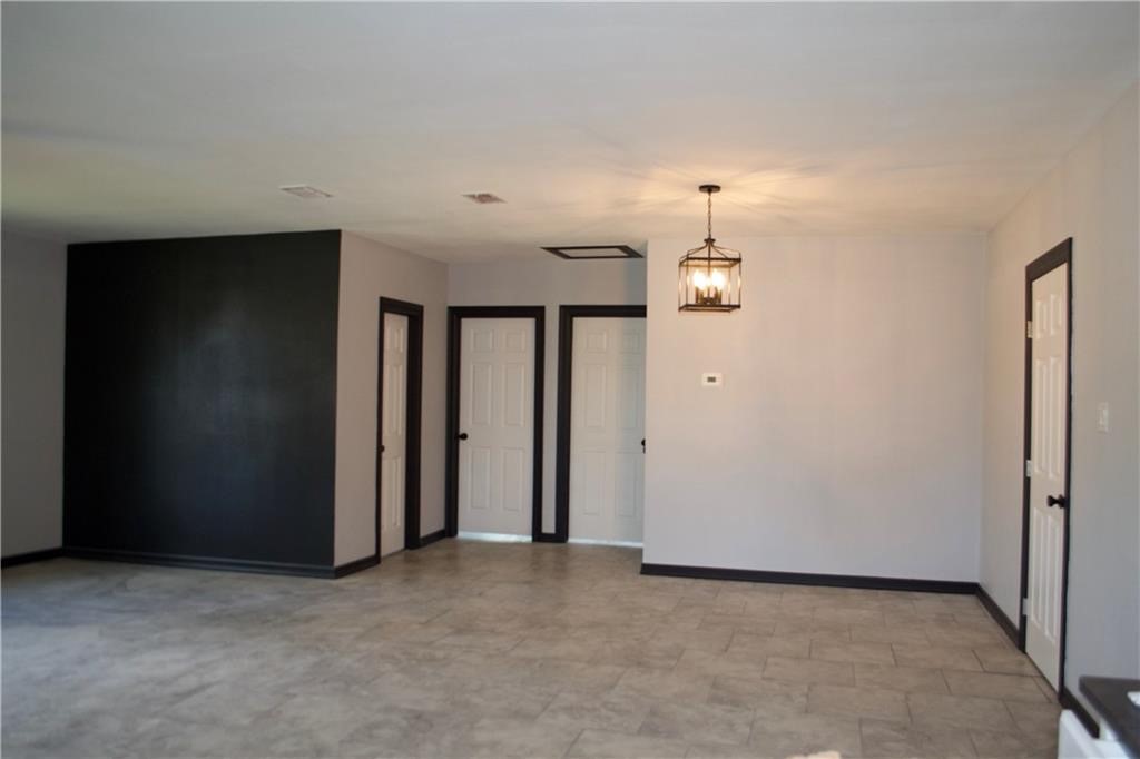 300 East Le Roy Street Three Rivers, TX 78071 - Photo 12 of 15 an empty room with closet and windows