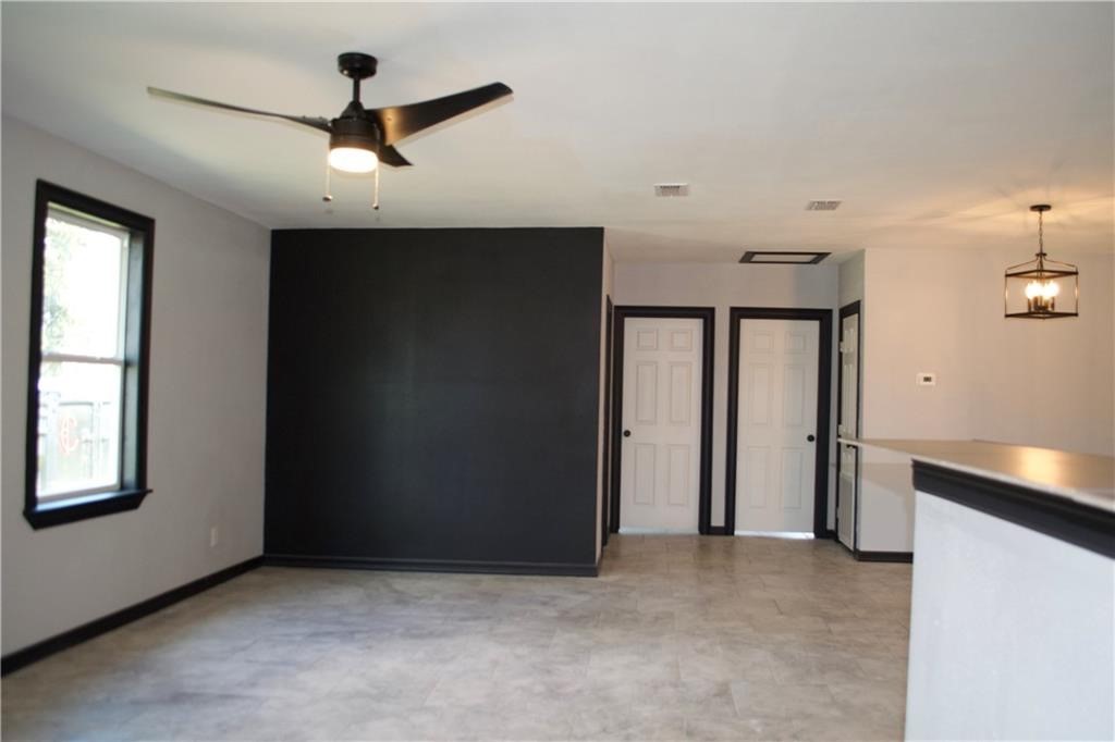 300 East Le Roy Street Three Rivers, TX 78071 - Photo 13 of 15 an empty room with closet and windows