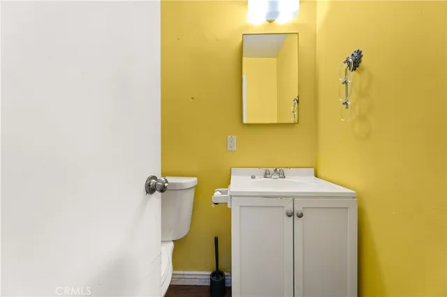 a bathroom with a sink and mirror