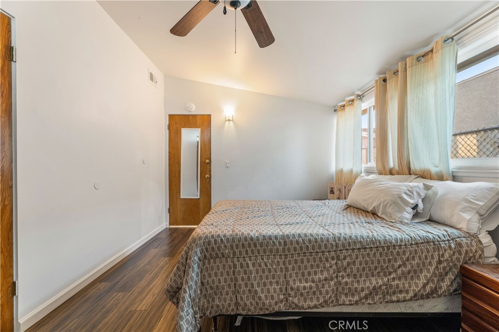 3340 East Poppy Street Long Beach, CA 90805 - Photo 18 of 39 a bedroom with a bed and a window