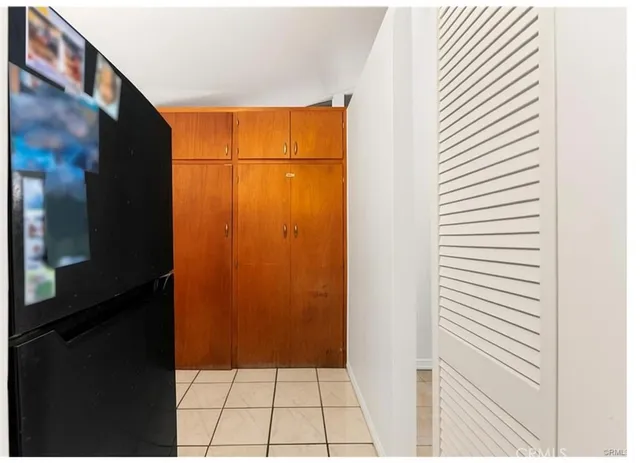 a kitchen with stainless steel appliances granite countertop a stove and a refrigerator