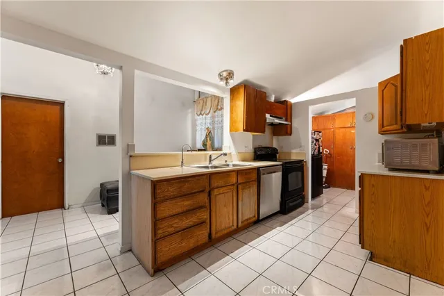 a room with furniture and potted plant