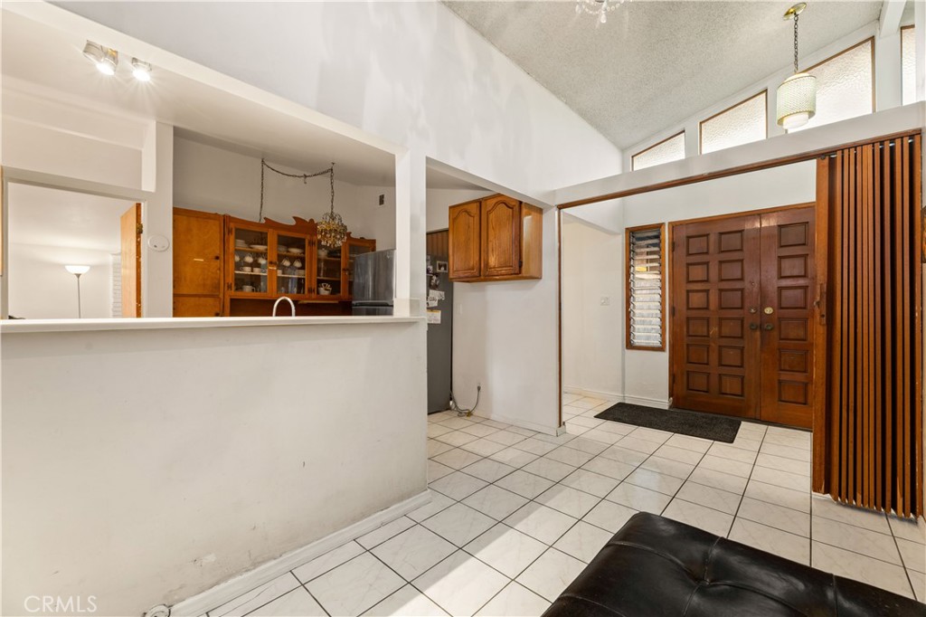 3340 East Poppy Street Long Beach, CA 90805 - Photo 4 of 39 a view of a car garage door