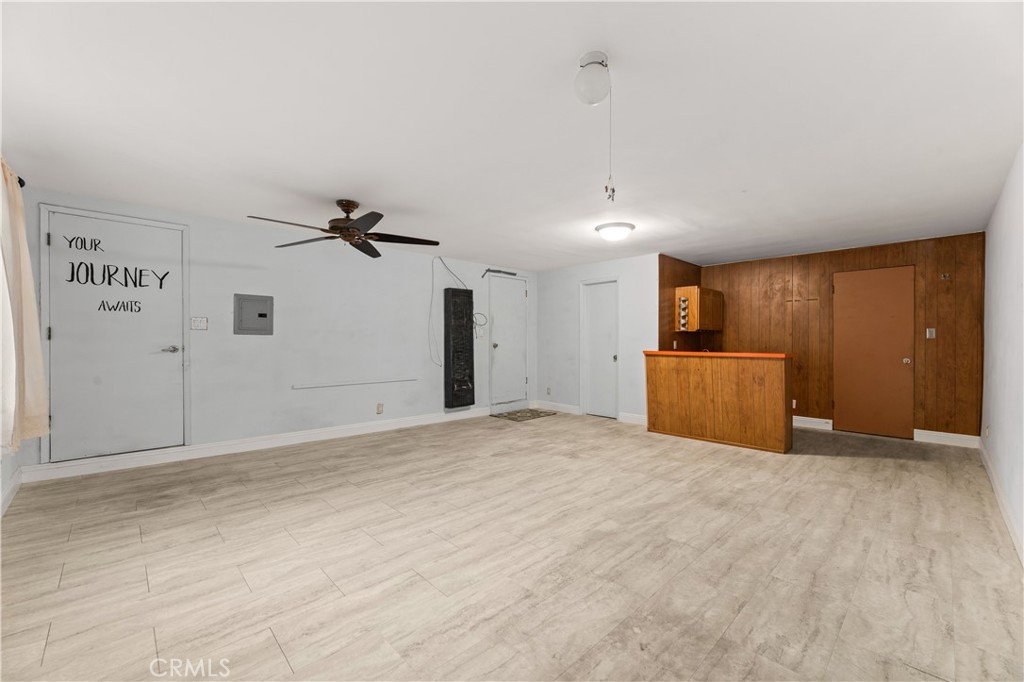 3340 East Poppy Street Long Beach, CA 90805 - Photo 8 of 39 a view of an empty room with a cabinet