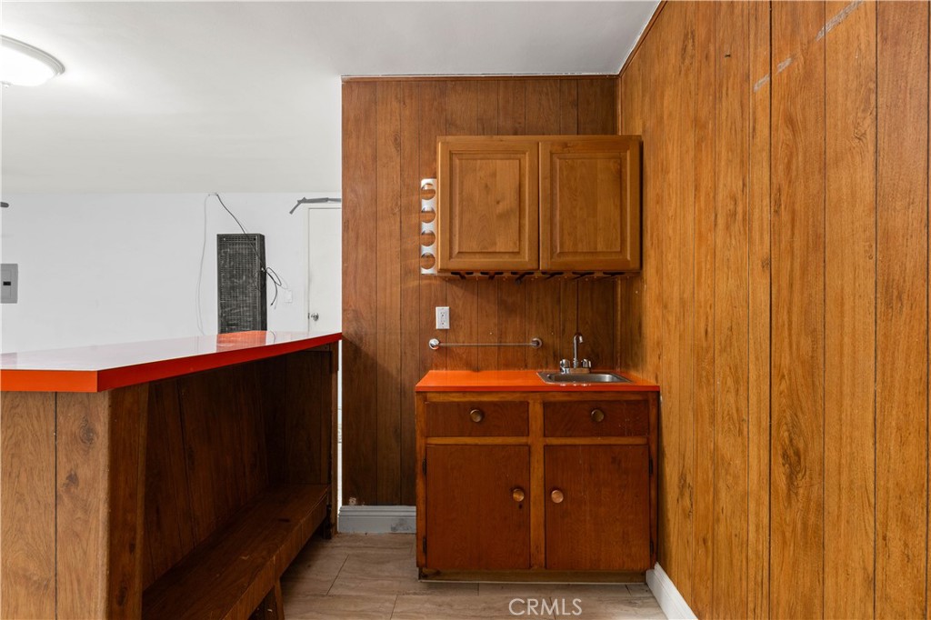 3340 East Poppy Street Long Beach, CA 90805 - Photo 9 of 39 a room with a closet and storage