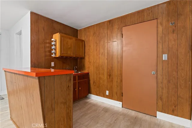 a bathroom with a mirror and a shower curtain