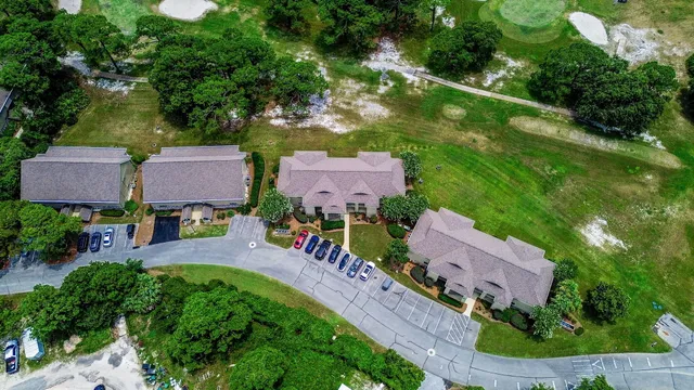 an aerial view of a house with a garden