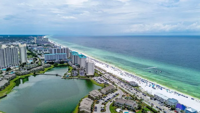 a view of a lake with a big yard