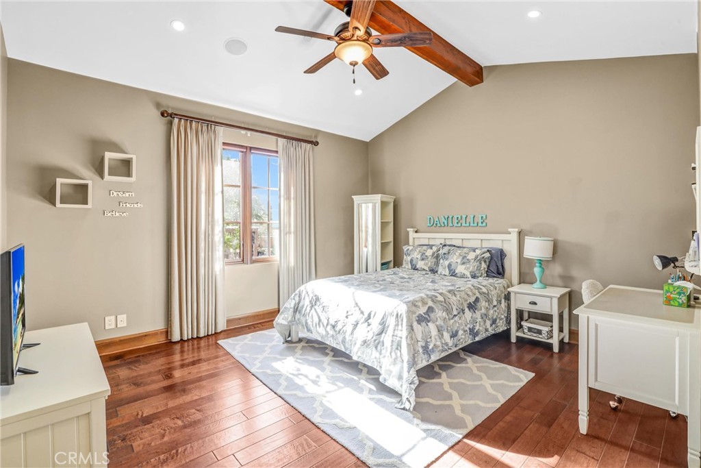 41 Needle Grass Irvine, CA 92603 - Photo 14 of 64 a bedroom with a bed and a chandelier